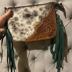 Cowhide purses with tooling detail